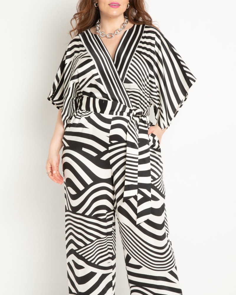 Front of a model wearing a size 26 Combo Scarf Print Jumpsuit in Night And Day by ELOQUII. | dia_product_style_image_id:303799